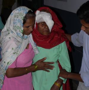 cataract patient supported by friends